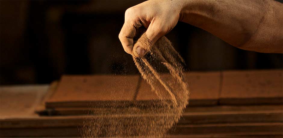 sanding the wooden mould